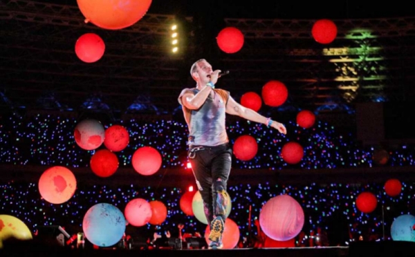 Dampak konser Coldplay terhadap ekonomi Indonesia.
