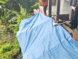 Hujan Lebat Sebabkan Longsor Tembok Penahan Tanah di Desa Tugujaya