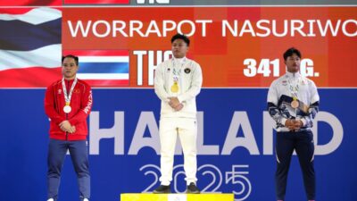 Atlet angkat besi Indonesia, Rahmat Erwin Abdullah sumbang medali emas di SEA Games 2025.