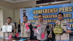 Polisi menunjukkan barang bukti ribuan tabung hasil praktik pengoplosan gas LPG subsidi.