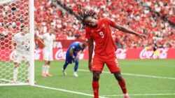 Swiss memastikan juara Grup B usai menaklukkan Kanada 2-1.