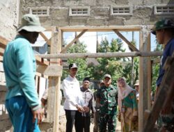 Kolaborasi Pemkab, BAZNAS Solsel dan Kodaeral II Padang Bangun 28 Rumah Mustahik