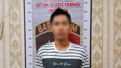Tersangka saat diamankan di Polres 50 Kota.