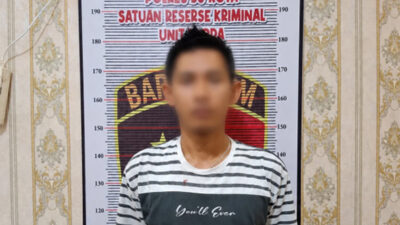 Tersangka saat diamankan di Polres 50 Kota.