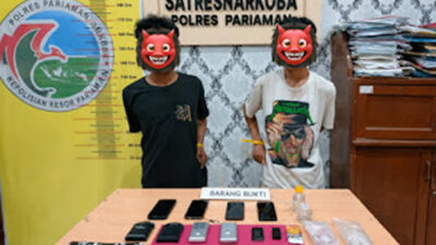 Tersangka saat diamankan di Polres Pariaman