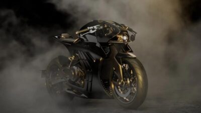 Aston Martin memperkenalkan AMB 002 Roadster, motor jalan raya pertama yang memadukan rangka titanium dan bodi serat karbon.